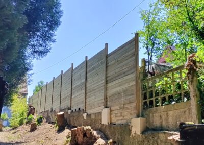 Palissade bois sur cloture béton éxistante